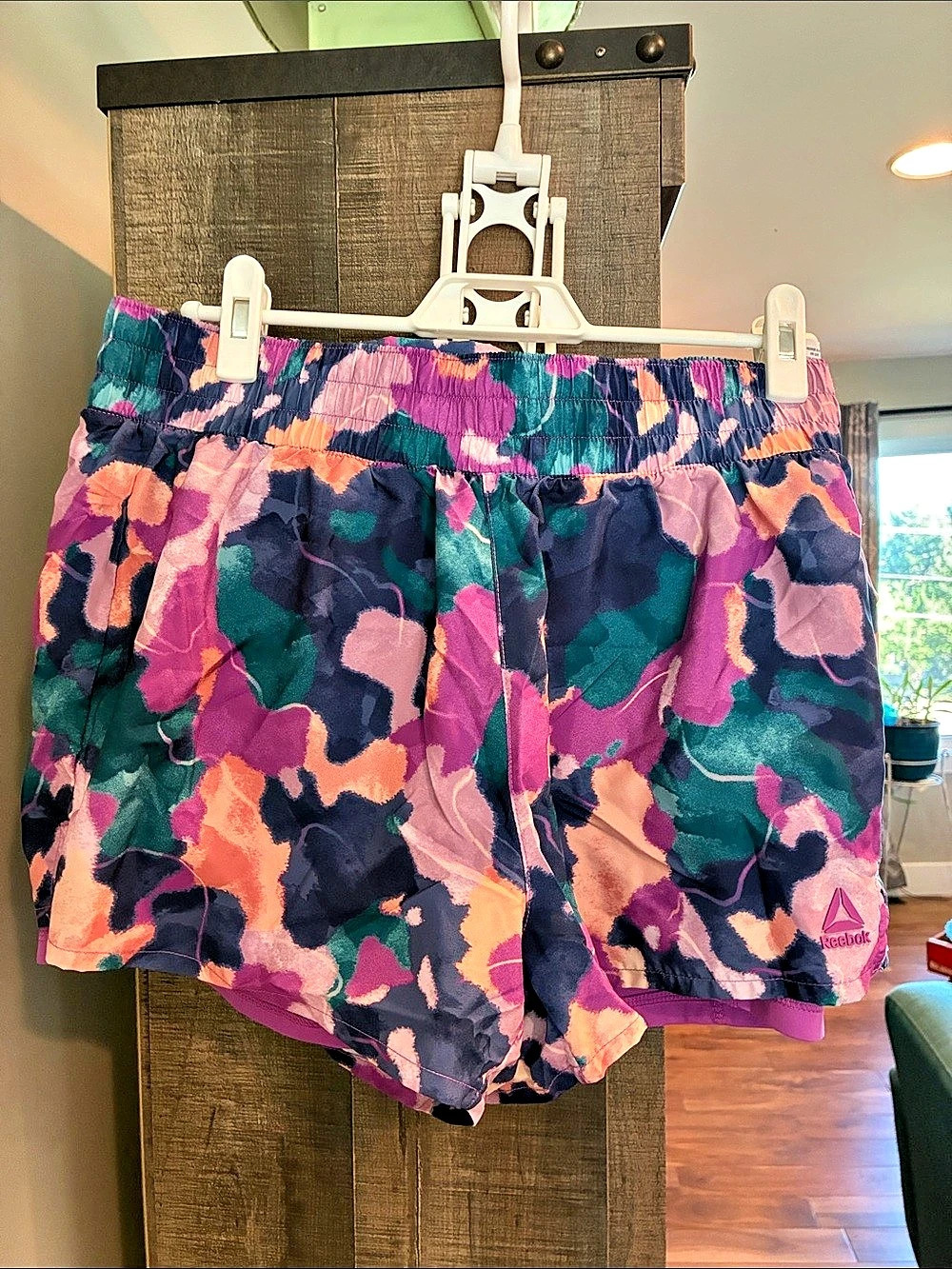 Reebok Women's Interlock Pull-On Running Shorts Purple & Pink